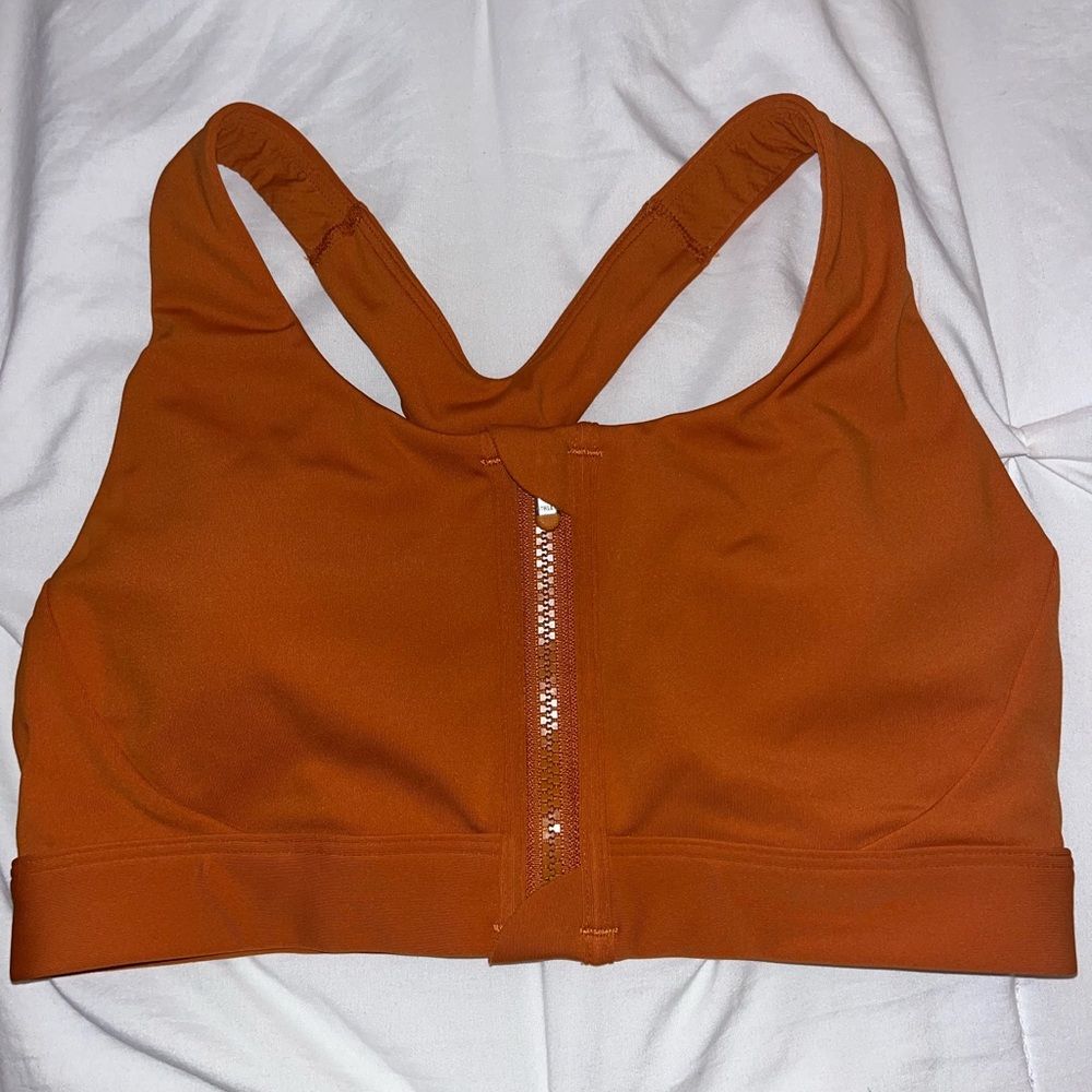 Athleta. Zip up sports bra. Orange. 32B.